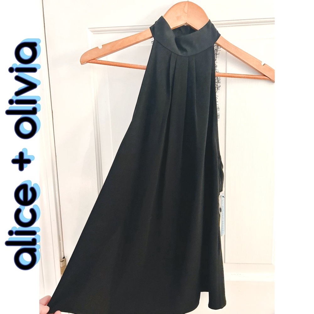AUTHENTIC NWT. alice + olivia  Black sleeveless blouse with back detail .